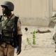 Nigerian soldiers patrol in the north of Borno state, close to a former Boko Haram camp, on June 5, 2013, near Maiduguri.
Quentin Leboucher/AFP/Getty Images